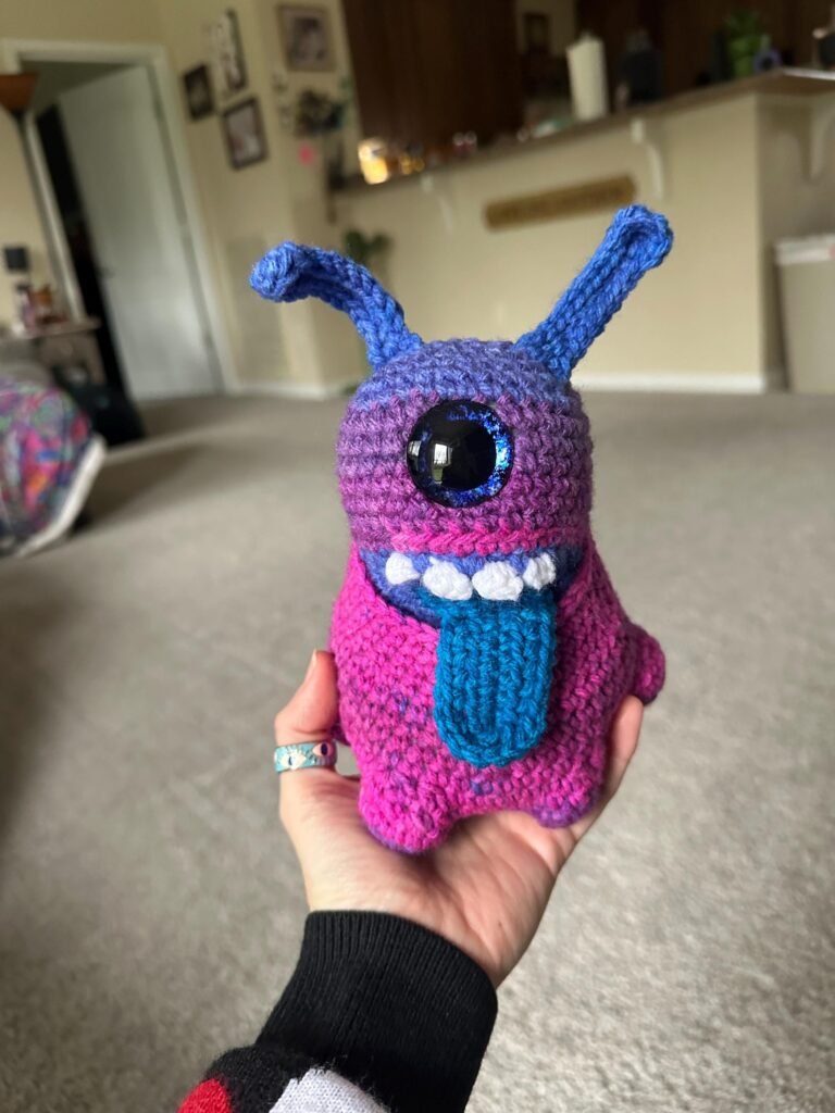Playful Blob Monster with Hand-Painted Eye